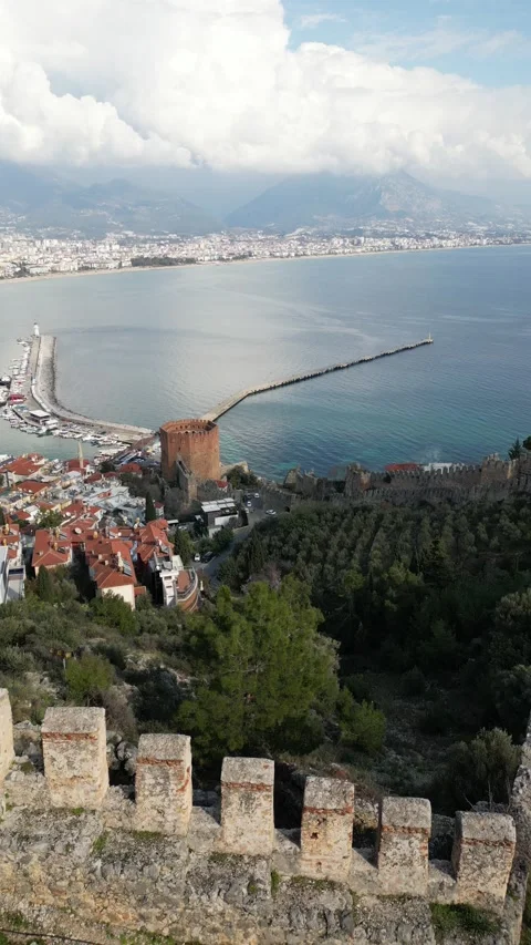 Red tower and historical settlement shooting with drone. Vertical Stock Footage 234332002