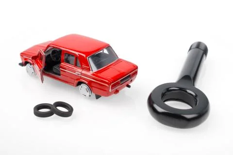 Red toy car and service tool Stock Photos
