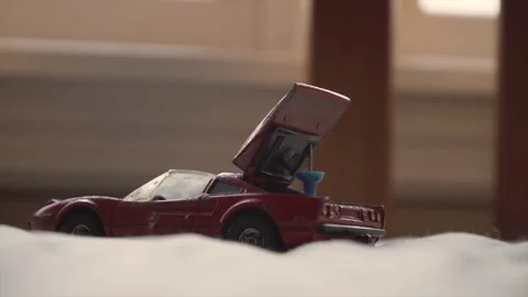 RED TOY CAR  Stockbeeldmateriaal 168203801