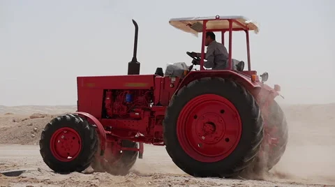 Red tractor in the desert egypt Stock Footage 67991859