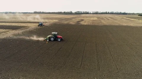 Red Tractor Mounted Seed Drill Plants the Seeds in the Soil in the Experimental Stock Footage 84646627