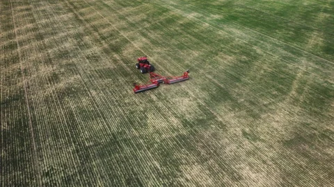 Red Tractor Pulling Roller Stock Footage 156472373