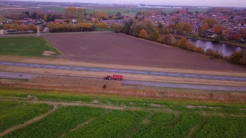 Red tractor with trailer Stock Footage 98158291