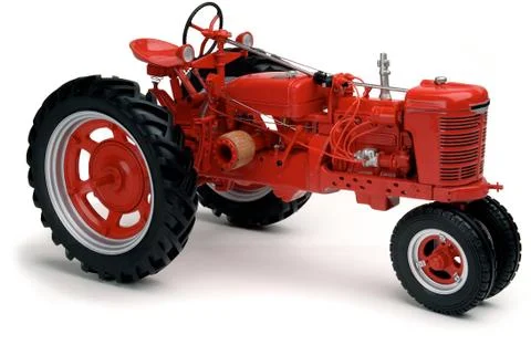 Red tractor on white Foto stock