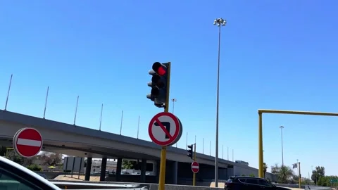 Red Traffic Light and No Turn Sign at Urban Intersection – 4K Daylight Shot. Stock-Footage 310392985