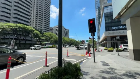 Red traffic light at city intersection near commercial building corner 4k Stock-Footage 337443507