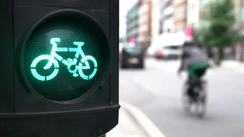 Red traffic light during a blurry morning adds an atmospheric touch to the .. Stock Footage 256737466