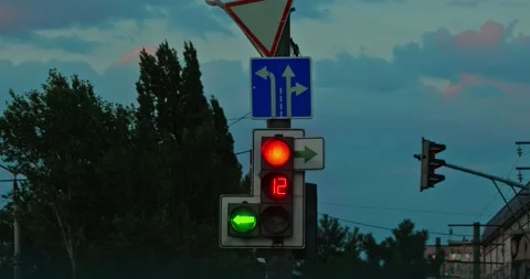 Red Traffic Light at Dusk Stock Footage 314449942