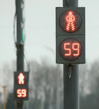 Red traffic light for a pedestrian with a countdown Foto stock