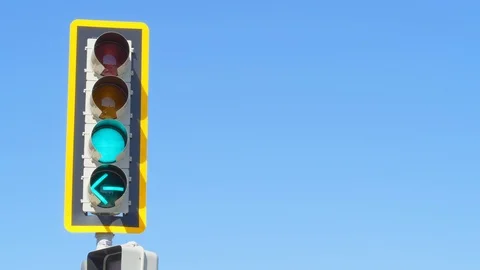 Red Traffic Light Turning to Green Traffic Light on Sunny Day with Blue Sky Video stock 92631008