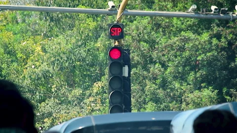 Red traffic signal countdown at road intersection in India Stock Footage 332613213