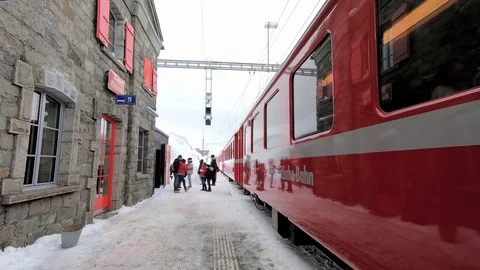 Red train of the Bernina Stock Footage 104425570
