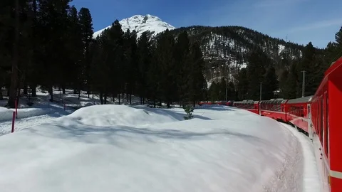 Red train of Bernina, panoramic view from inside the locomotive. Bernina Express Video stock 88652418