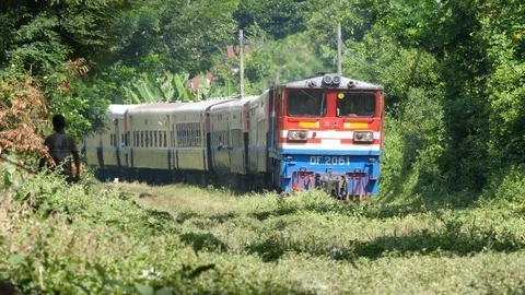 Red Train in the forest in Burma, Shan State, Asia in 4K Stock Footage 94877803