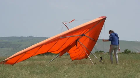Red training hang glider Stock Footage 64592957