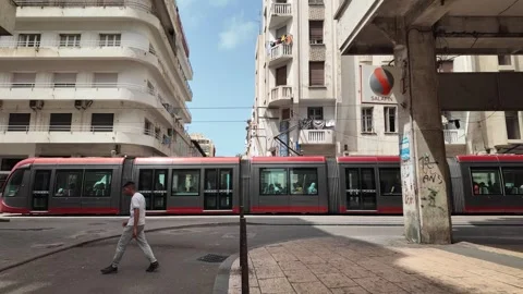 Red Tram Crossing Mohammed V Square in Casablanca, Morocco August 3, 2025 Stock-Footage 314308849