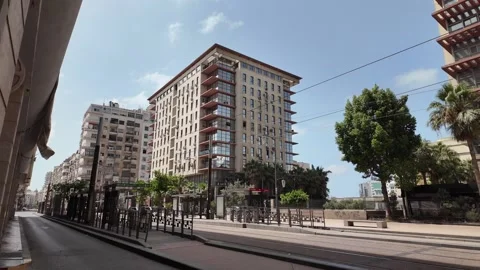 Red Tram Crossing Mohammed V Square in Casablanca, Morocco August 3, 2025 Stock Footage 314308952