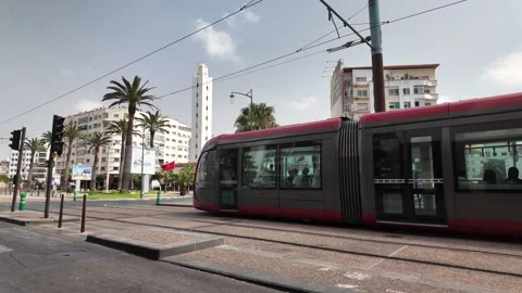 Red Tram Crossing Mohammed V Square in Casablanca, Morocco August 3, 2025 Stock Footage 314308986