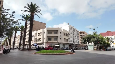 Red Tram Crossing Mohammed V Square in Casablanca, Morocco August 3, 2025 Stock Footage 314309185