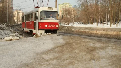 Red tram running on tramway Stock Footage 21276867