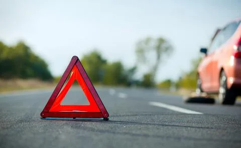 Red triangle of a car Stock Photos