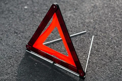 Red triangle of a car Stock Photos