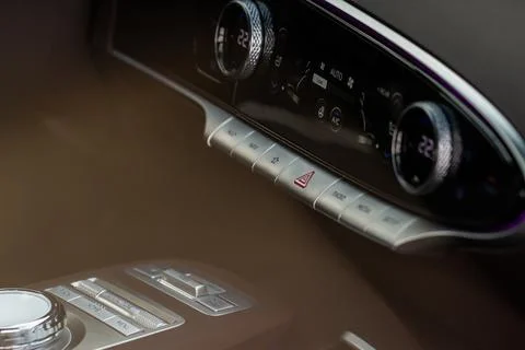 Red triangle hazard light button on car dashboard. Car media buttons dashboar Foto stock