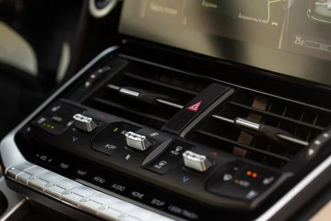 Red triangle hazard light button on car dashboard. Car media buttons dashboar Stock Photos