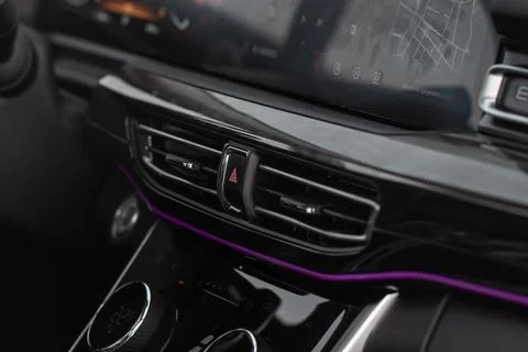 Red triangle hazard light button on car dashboard. Car media buttons dashboar Stock Photos
