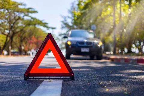 Red triangle, red emergency stop sign, red emergency symbol with  car stop an Stock Photos