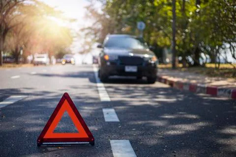 Red triangle, red emergency stop sign, red emergency symbol with  car stop an Stock Photos