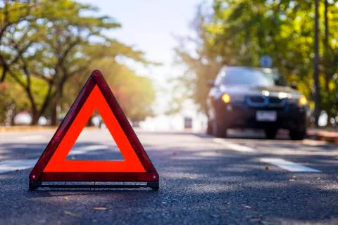 Red triangle, red emergency stop sign, red emergency symbol with  car stop an Stock Photos