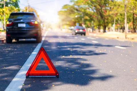 Red triangle, red emergency stop sign, red emergency symbol with  car stop an Stock Photos