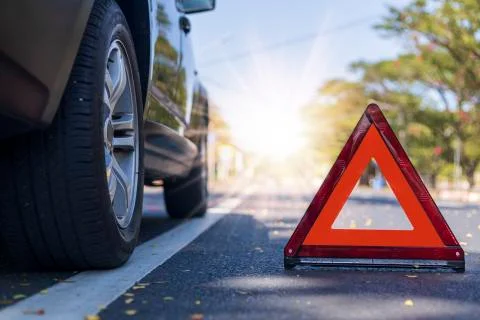 Red triangle, red emergency stop sign, red emergency symbol with  car stop an Stock Photos