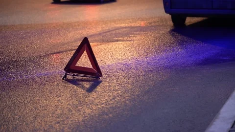 Red triangle is on the road Stock Footage 297297489