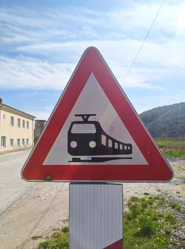 Red triangle traffic sign of train Stock Photos