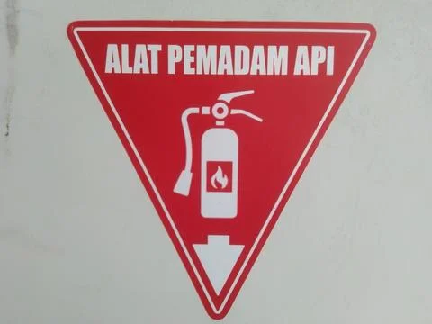Red Triangle Warning Sign for Fire Extinguisher Equipment. Stock Photos