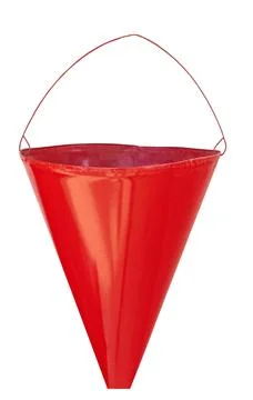 Red triangular fire bucket Stock Photos