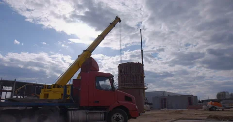 A red truck with a multi-axle platform has arrived for loading Stock Footage 161963547