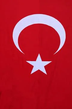 Red Turkish flag with crescent and star Stock Photos