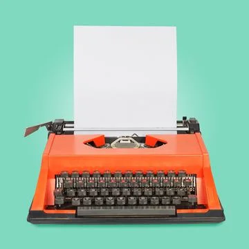 Red typewriter on green background Stock Photos
