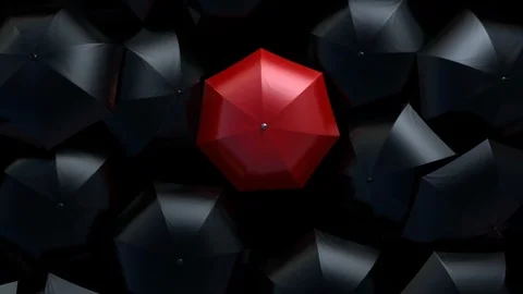 Red Umbrella Wades Through a Flow of Black Umbrellas 스톡 동영상 111430201