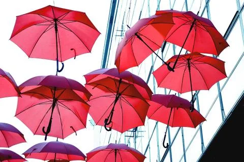 Red umbrellas Stock-Fotos