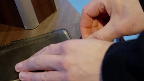 Red usb cable inserted to phone for charging, close up Stock Footage 259952986