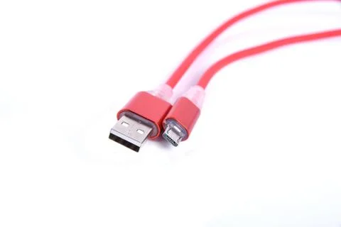Red USB cable for smartphone charge isolated on white background. 스톡 사진