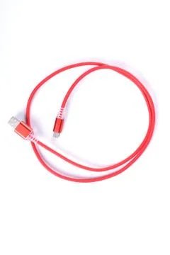 Red USB cable for smartphone charge isolated on white background. Stock Photos