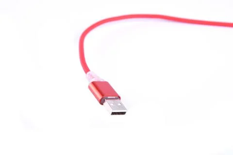 Red USB cable for smartphone charge isolated on white background. Stock Photos