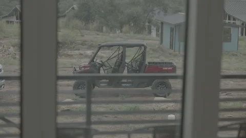 Red Utility Vehicle (UTV) or All Terrain Vehicle (ATV) Offroad Stock Footage 323401578