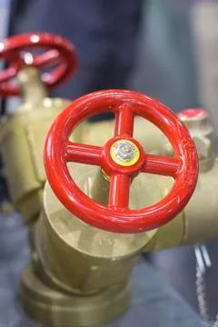 Red valve of fire hydrant Stock Photos