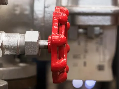 Red valve handle Stock Photos